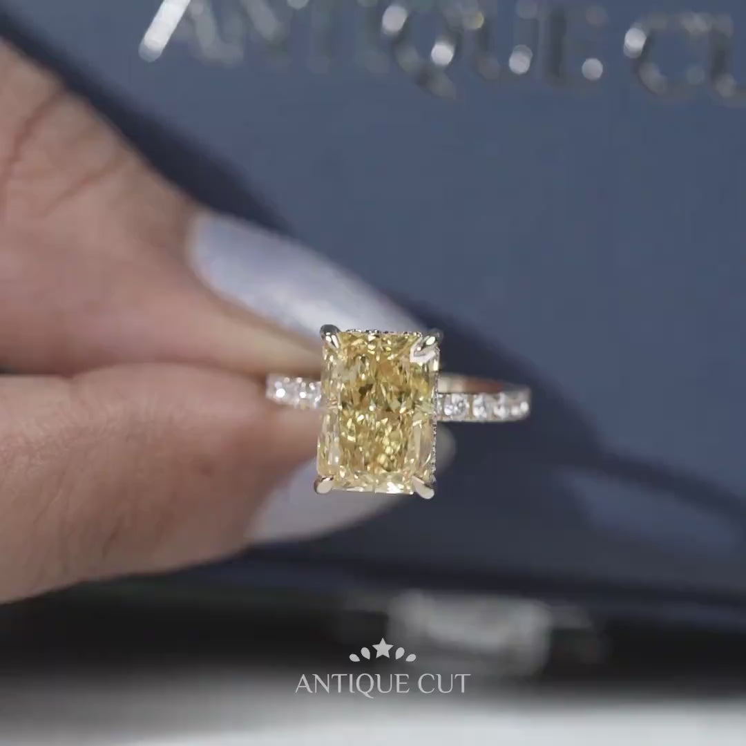 Yellow diamond ring with hidden halo and pave band