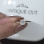 Yellow gold cushion diamond engagement ring with hidden detail
