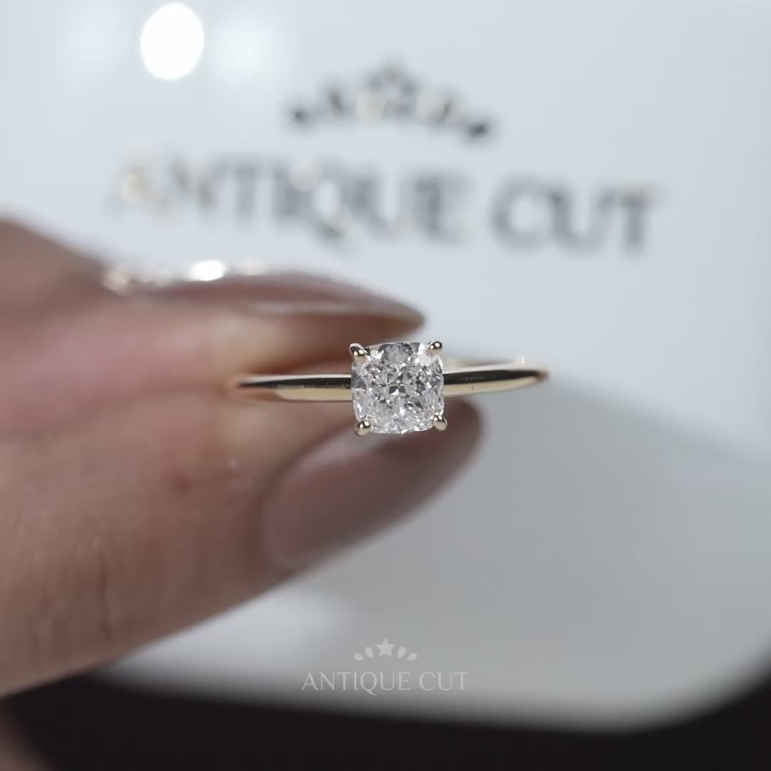 Yellow gold cushion diamond engagement ring with hidden detail