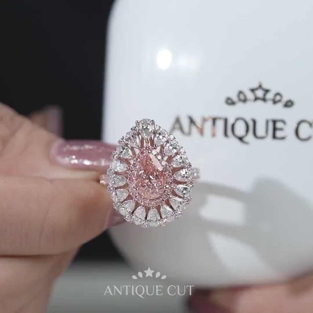 Pear-shaped pink diamond halo engagement ring rose gold