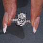 Oval lab grown diamond ring with four claw prongs
