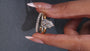 Pear-shaped lab grown diamond ring with pavé band
