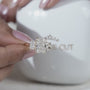 Three stone radiant cut engagement ring in white gold