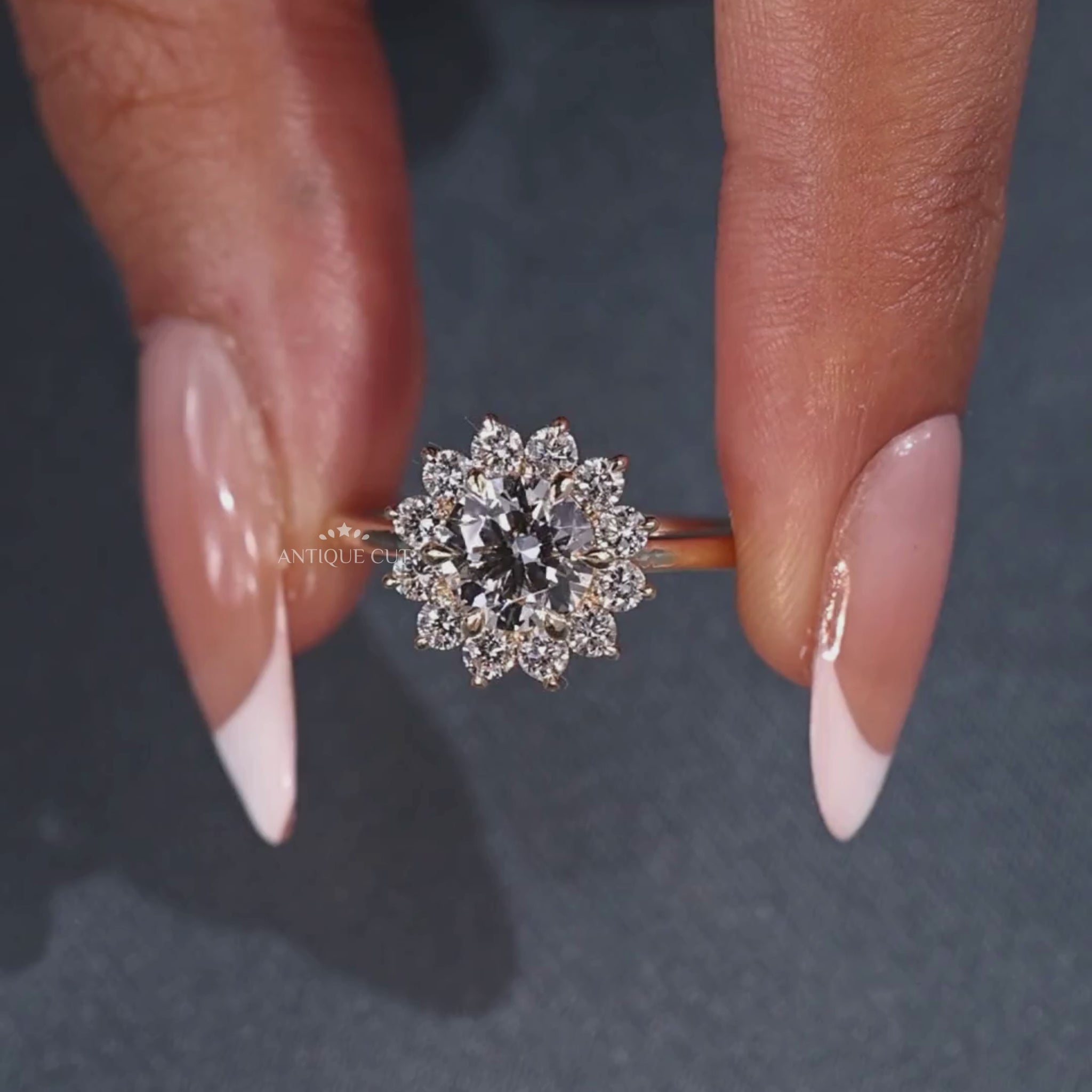 Round cut diamond halo ring with floral design