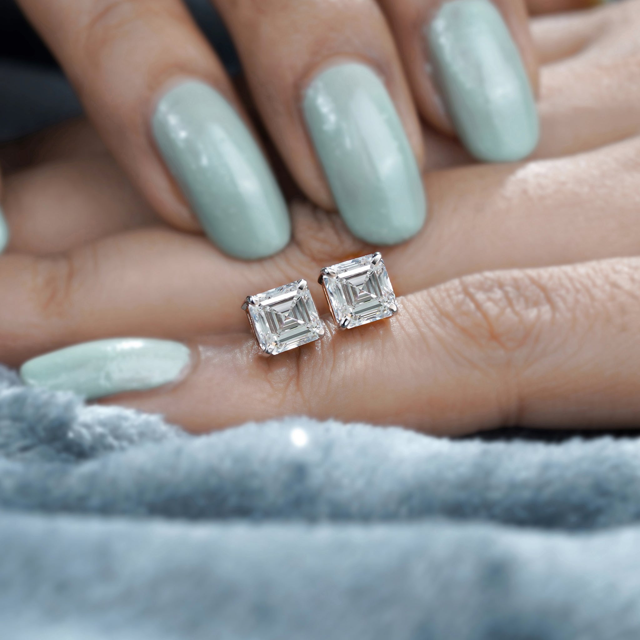 Asscher diamond earrings 4-prong setting close up
