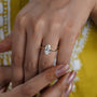 Marquise cut diamond solitaire engagement ring in yellow gold