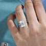 white gold emerald cut hidden halo diamond ring