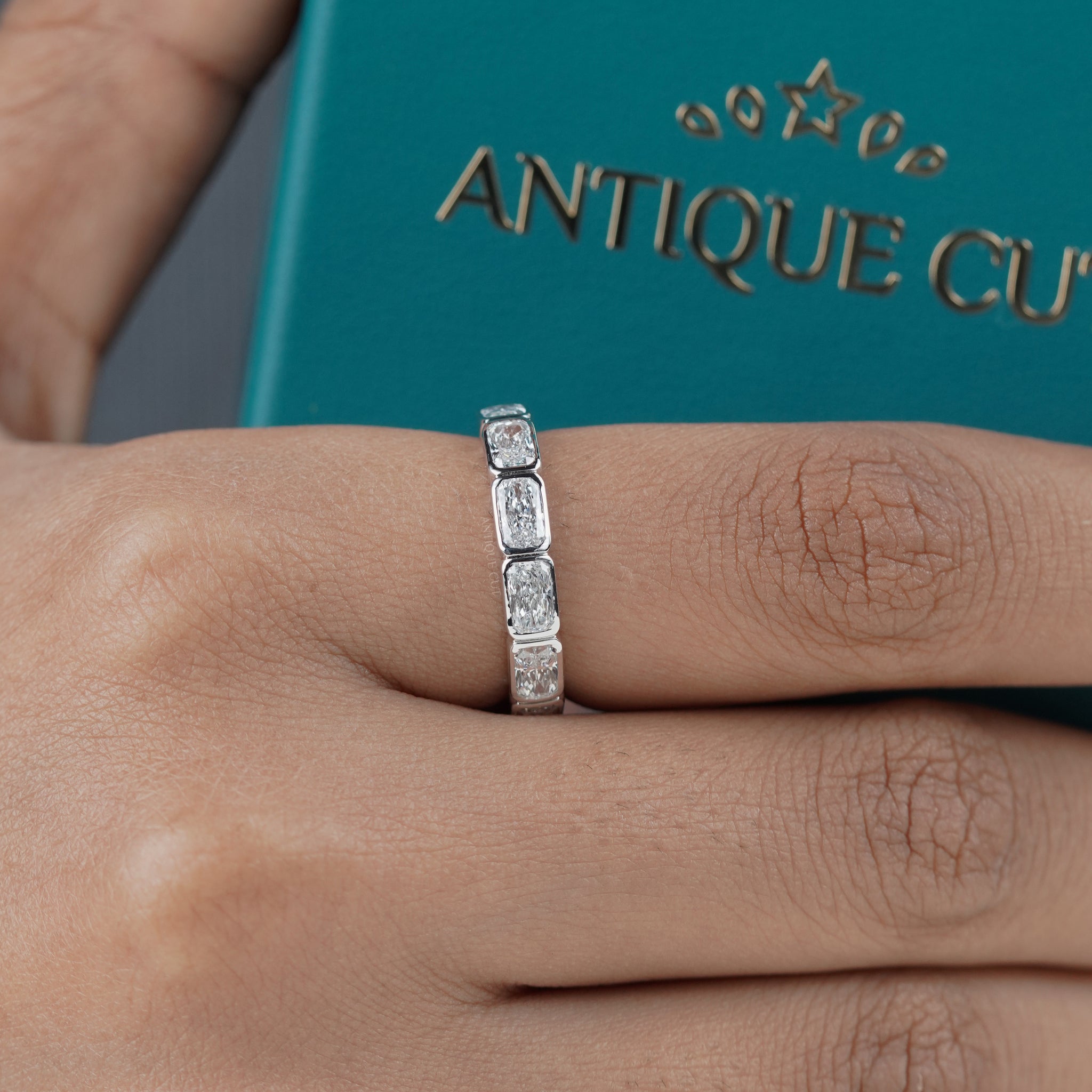 Platinum radiant bezel wedding band with IGI-certified lab-grown diamonds