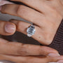 White gold emerald cut diamond bezel engagement ring