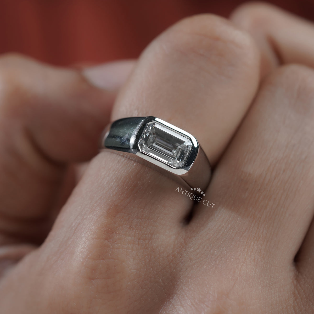 East west emerald cut diamond engagement ring