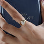 Cushion cut diamond bezel engagement ring with yellow gold band
