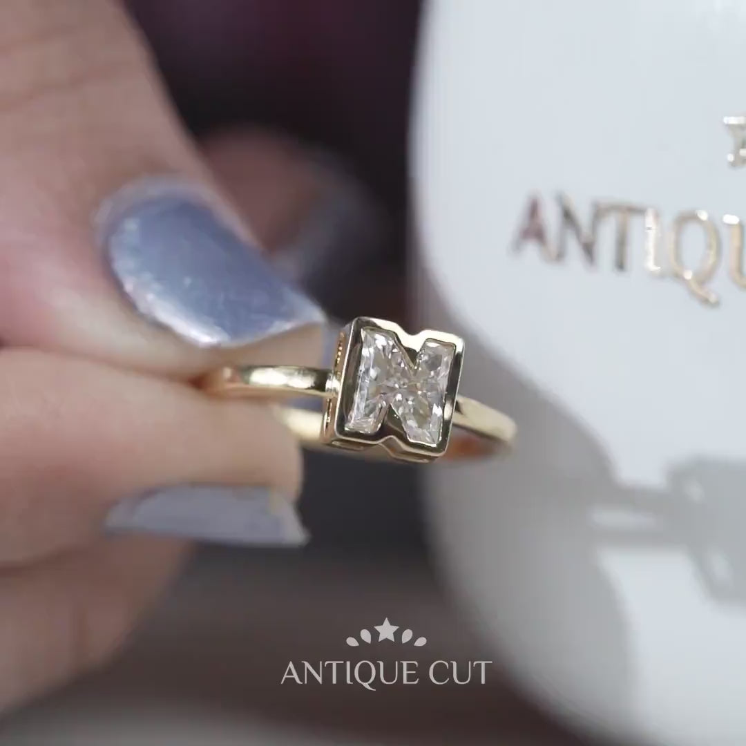 Yellow gold N initial diamond ring bezel setting