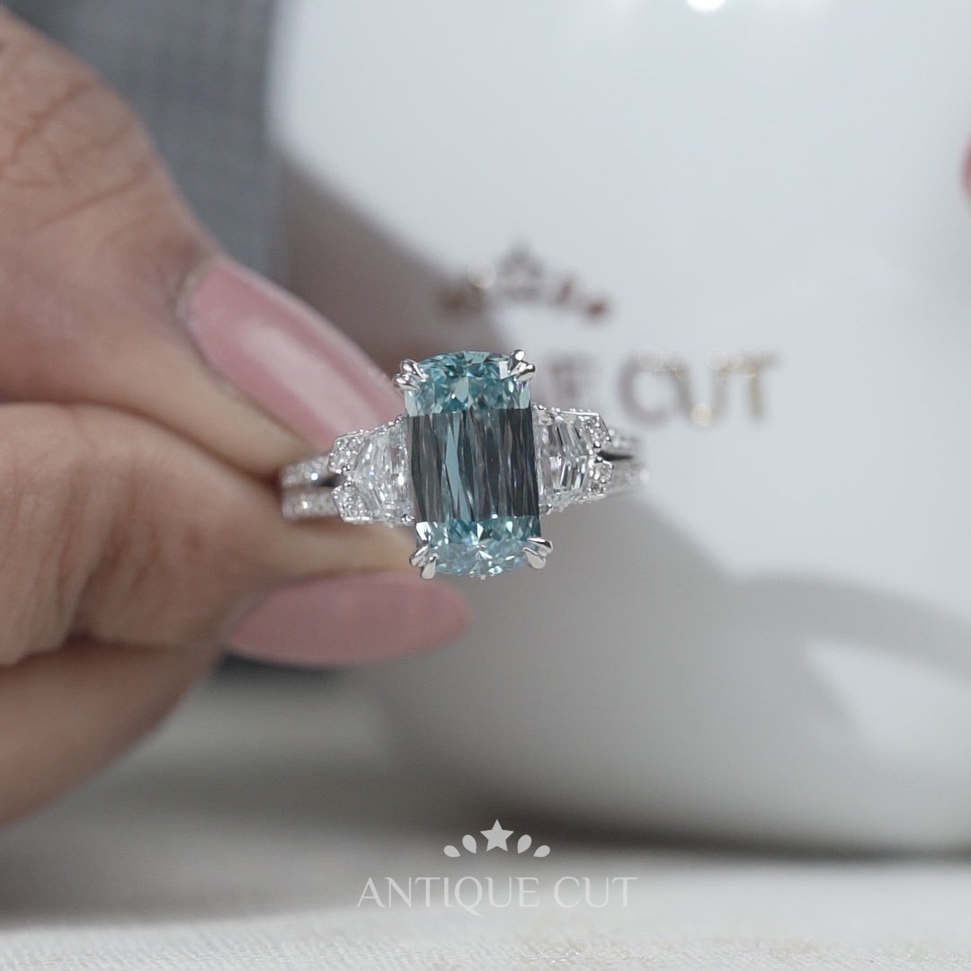 White gold cushion blue diamond engagement ring