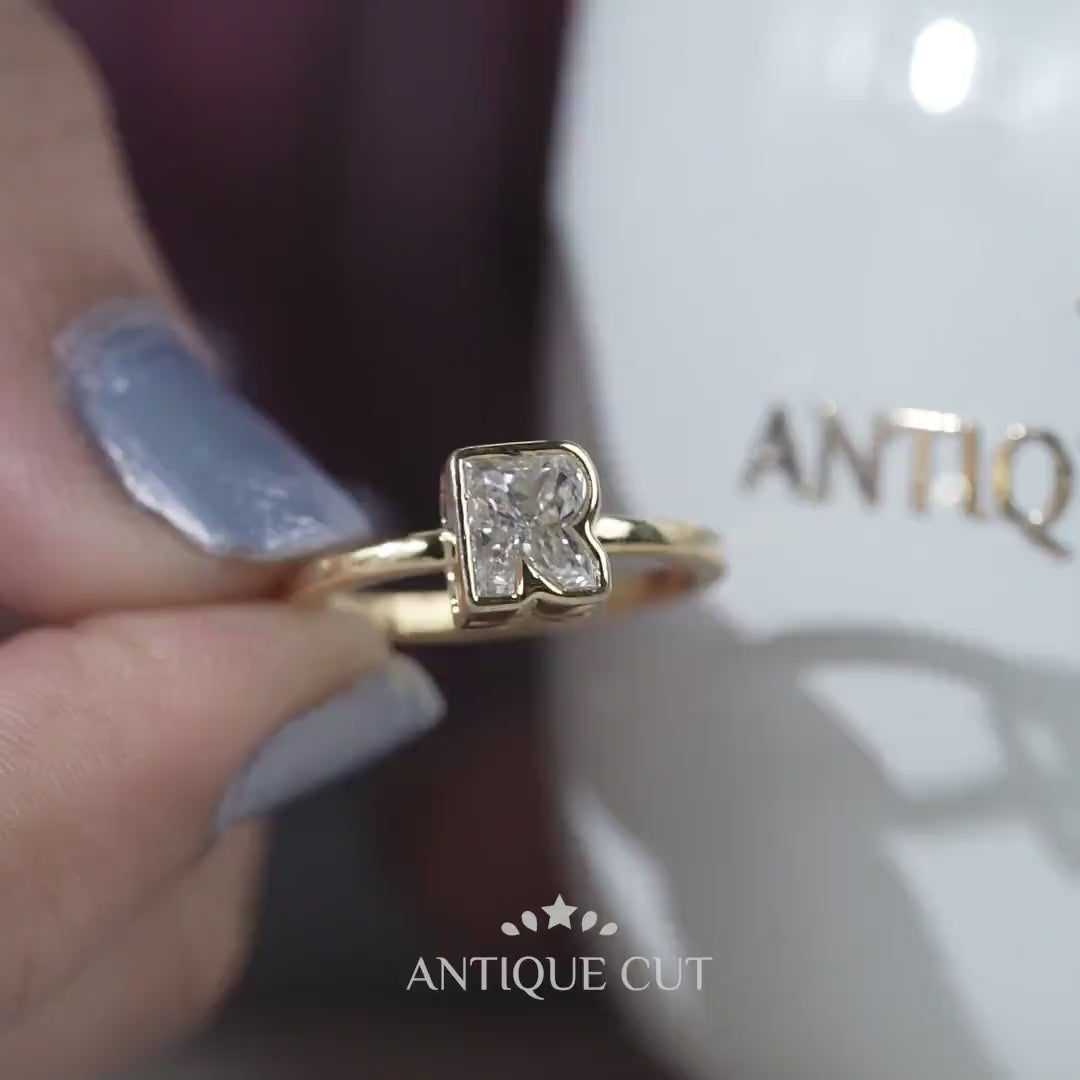 Yellow gold R initial diamond ring bezel setting