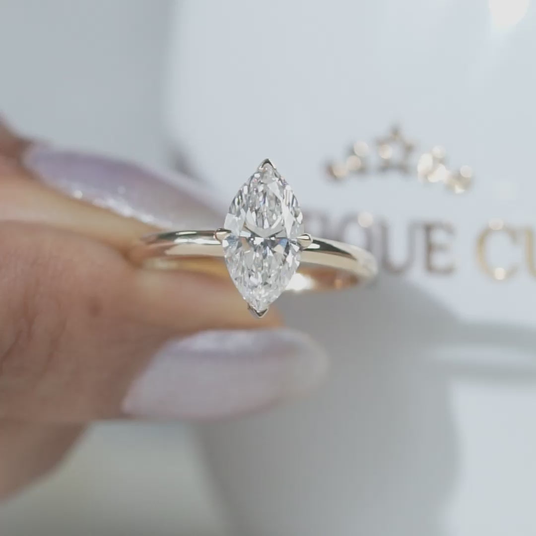 Marquise cut solitaire diamond engagement ring