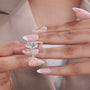 Pear lab grown diamond ring featuring a bezel setting and yellow gold design
