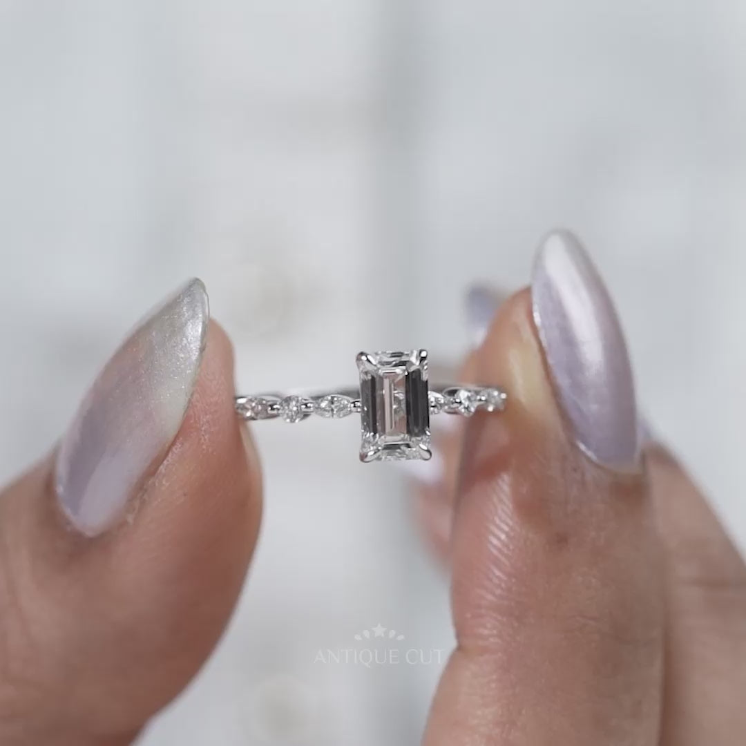 White gold emerald cut diamond engagement ring