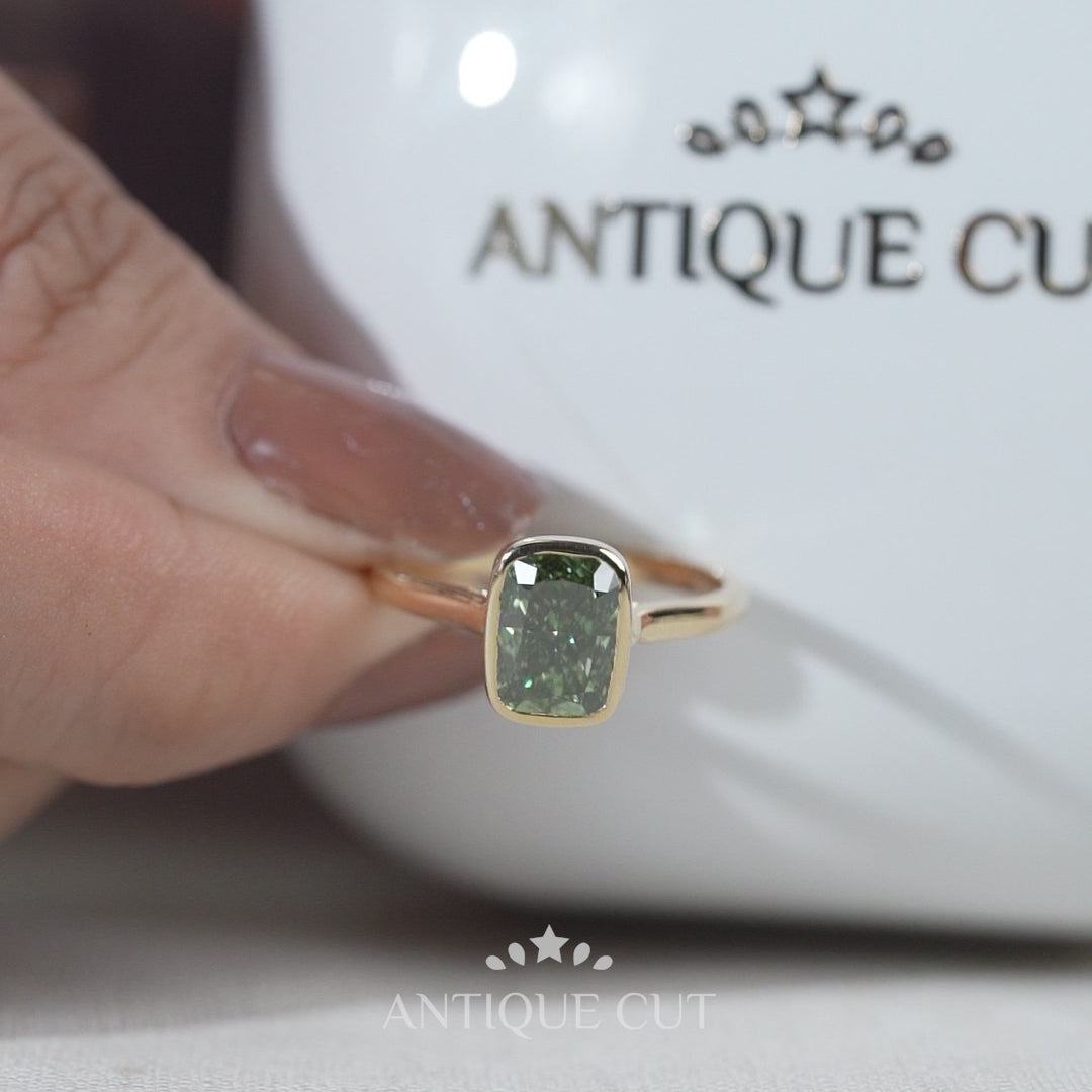 Yellow gold fancy green cushion cut diamond ring