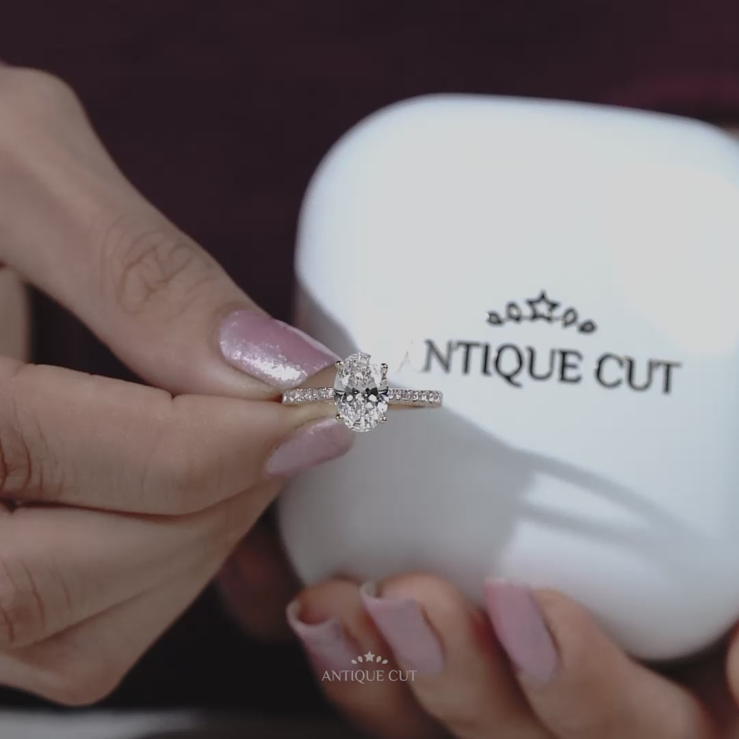 Oval cut yellow gold engagement ring