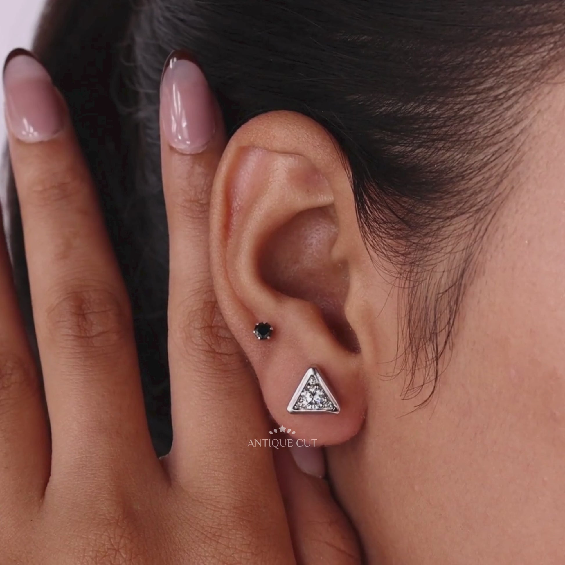 White gold triangle stud earrings with round diamonds