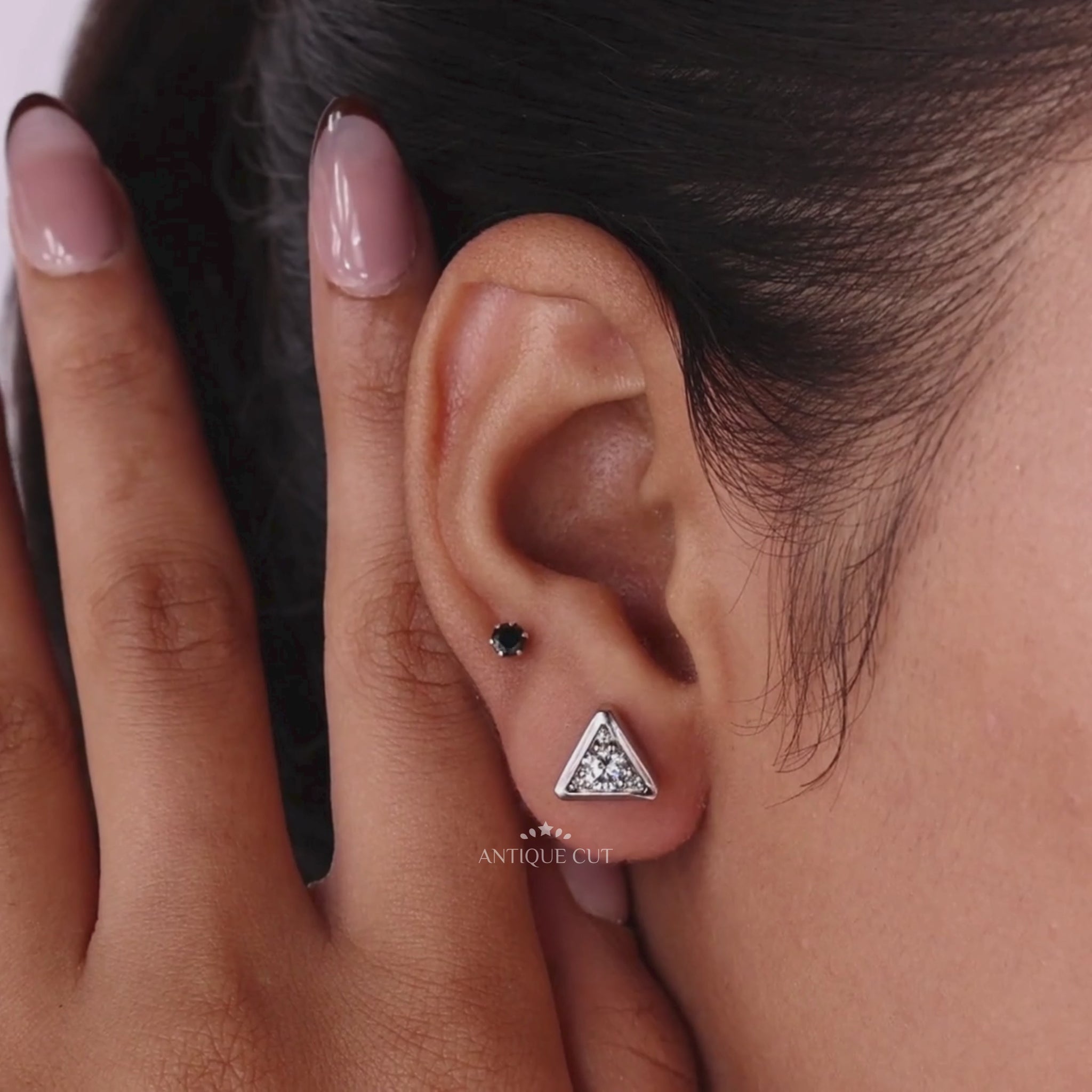 White gold triangle stud earrings with round diamonds