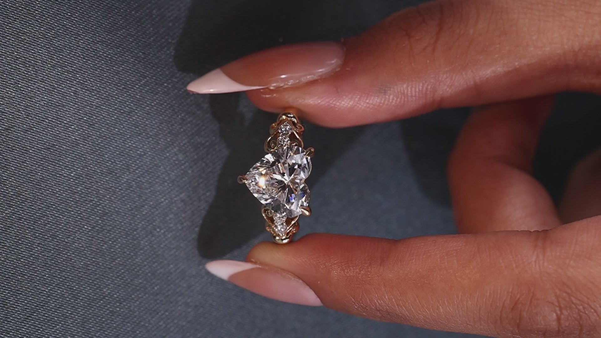 Heart cut diamond ring with a three claw prong setting