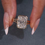 Radiant cut diamond ring with split shank band