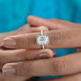 White gold emerald cut halo diamond ring