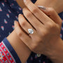 White gold pear diamond ring with hidden halo