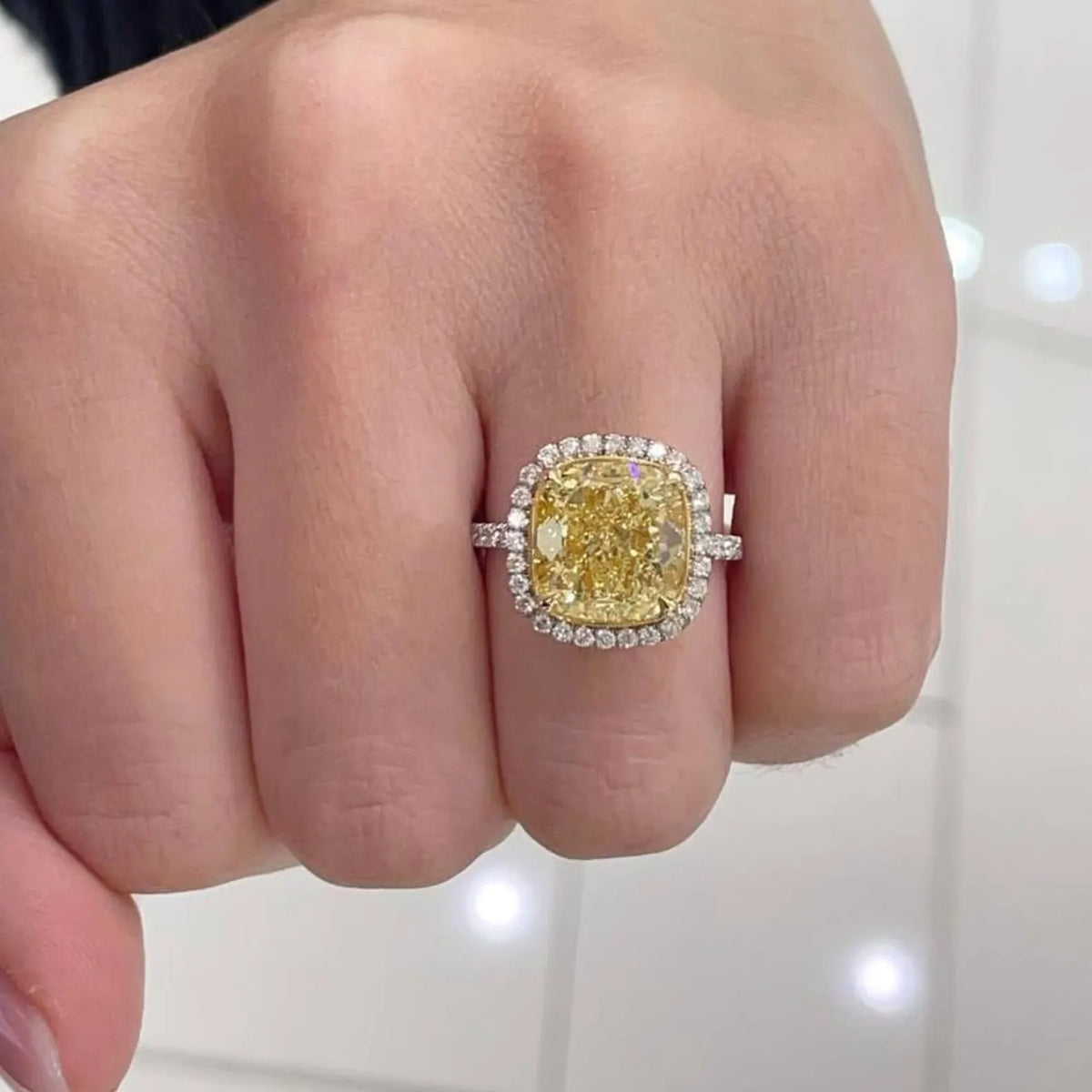 Cushion cut yellow diamond with pavé white gold band video