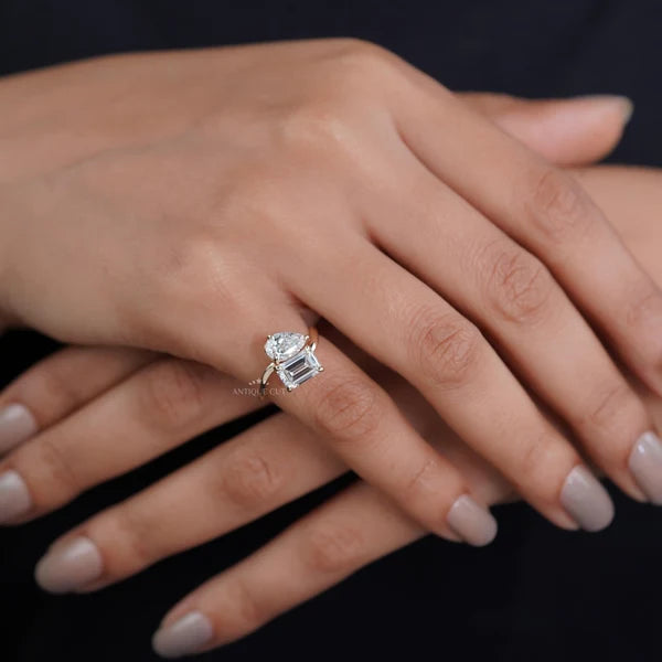 Antiquecut emerald and pear diamond engagement ring