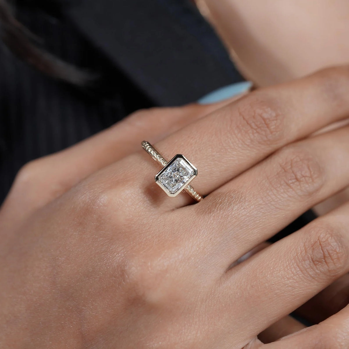 Yellow gold radiant diamond ring with hidden halo