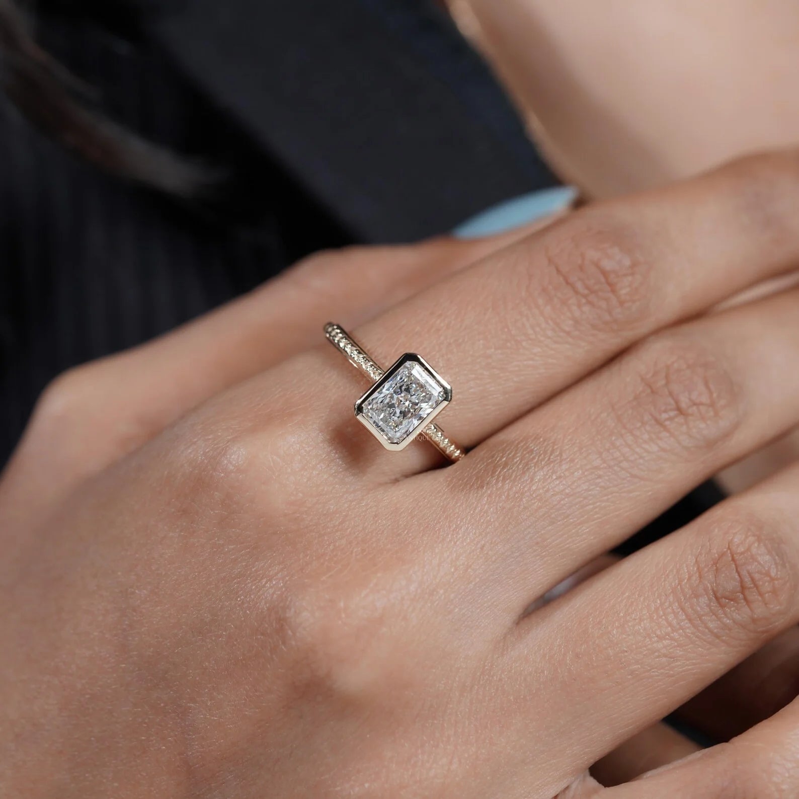 Yellow gold radiant diamond ring with hidden halo