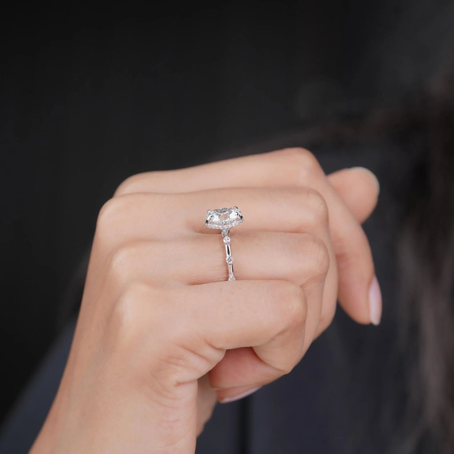 Lab grown oval diamond engagement ring with accent diamonds