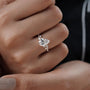 Pear cut diamond engagement ring with claw prong setting 