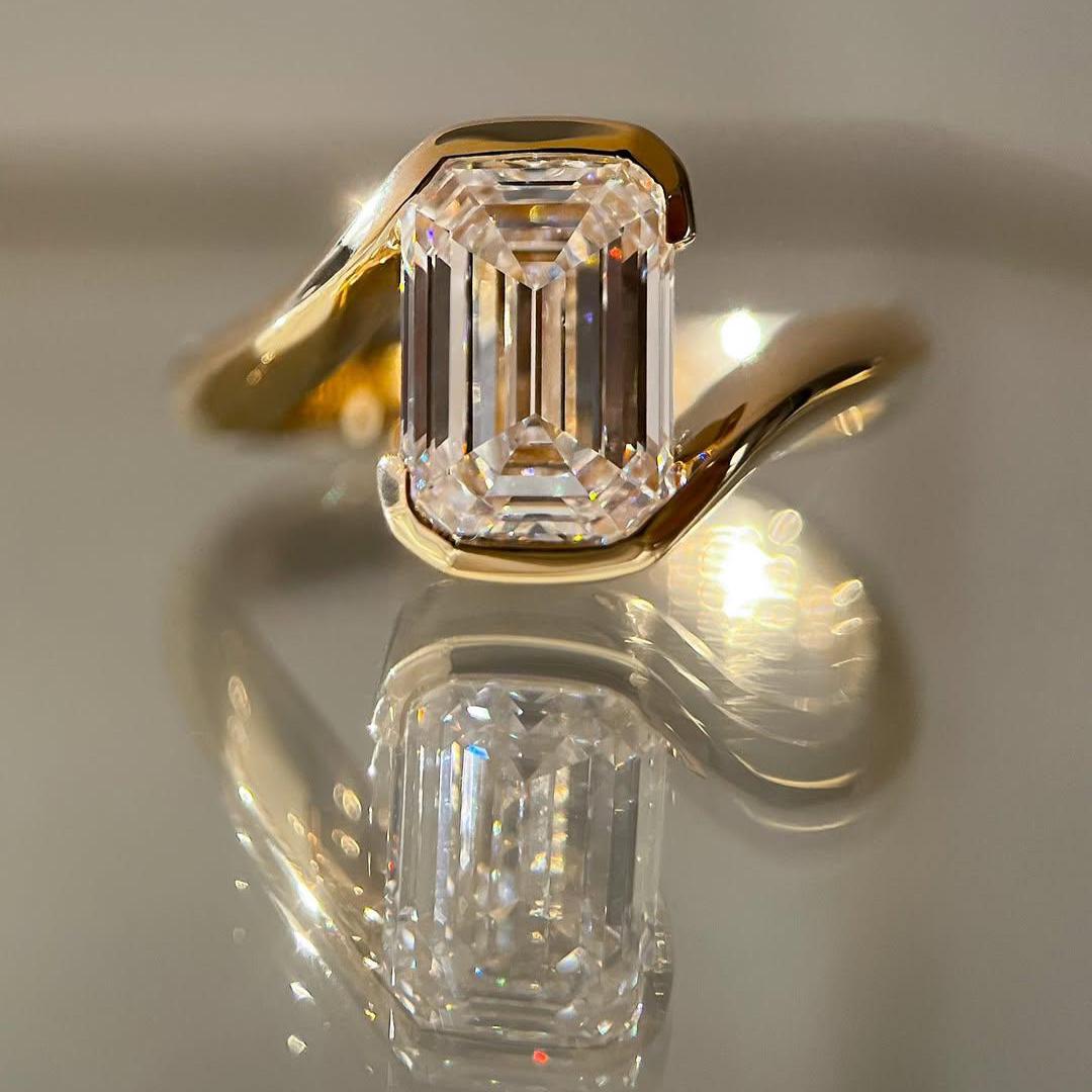 IGI-certified emerald cut pink diamond engagement ring with solitaire setting