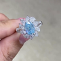 Light blue diamond cluster oval engagement ring with pear and marquise side stones video