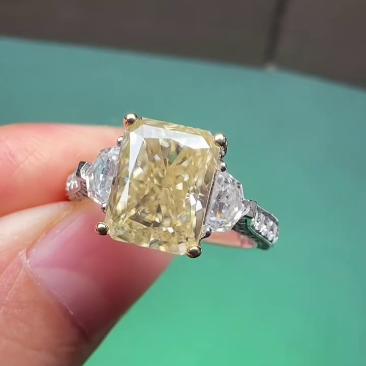 Yellow Radiant Diamond Ring with Trapezoid Side Stones