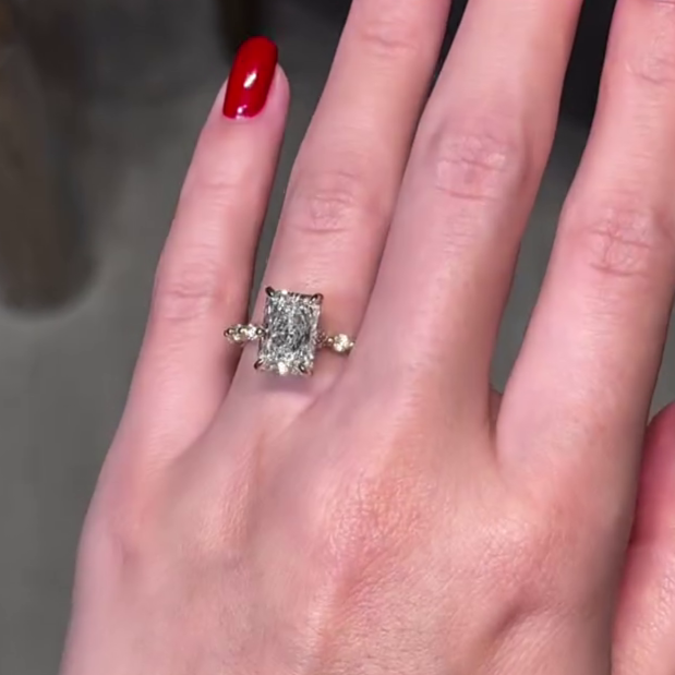 Radiant diamond ring with hidden halo in gold