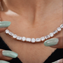 Rose gold diamond tennis necklace with round and emerald cuts