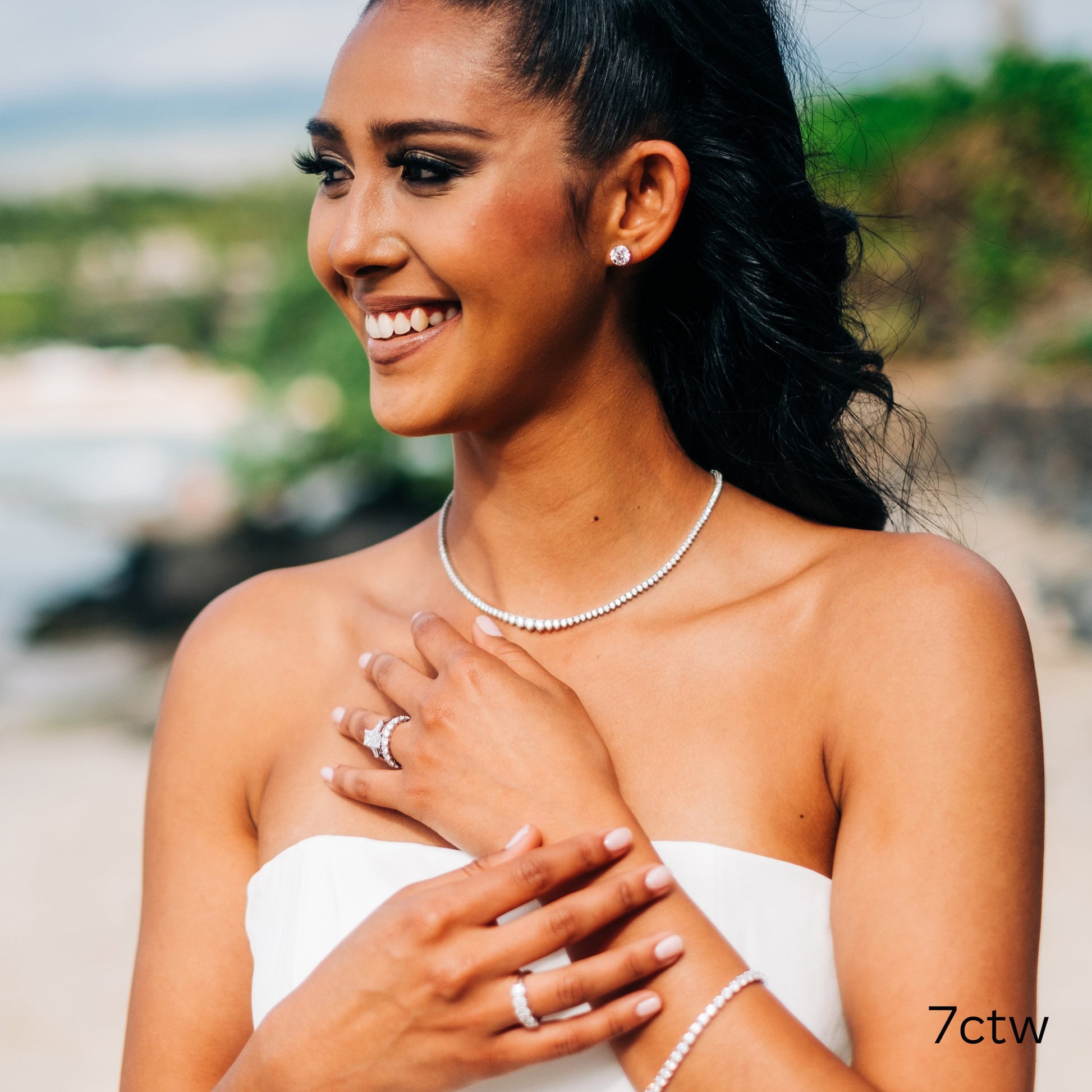 Woman wearing diamond jewelry.