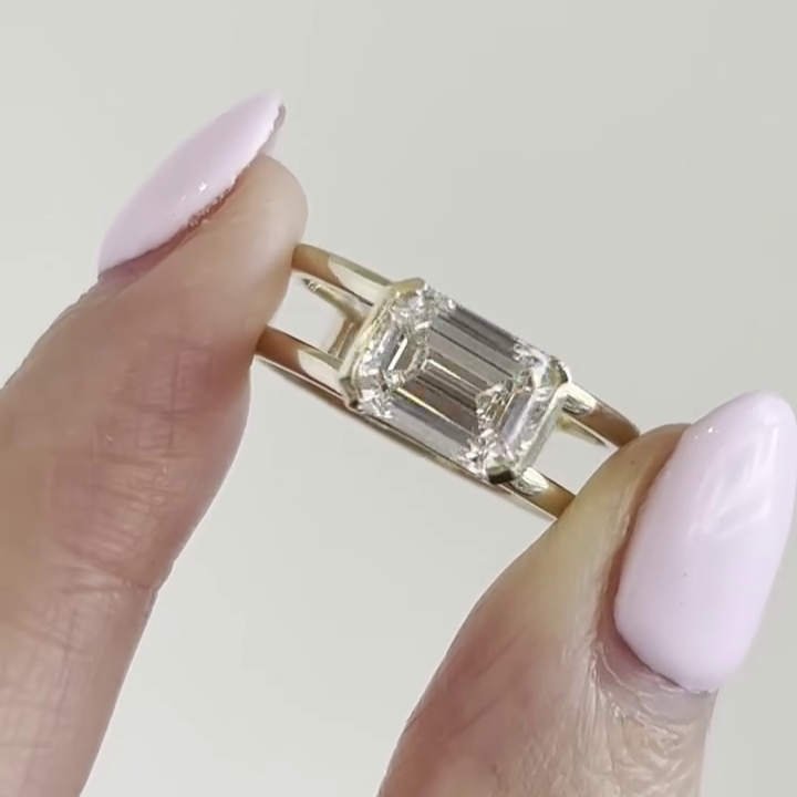 Emerald cut double band ring in yellow gold
