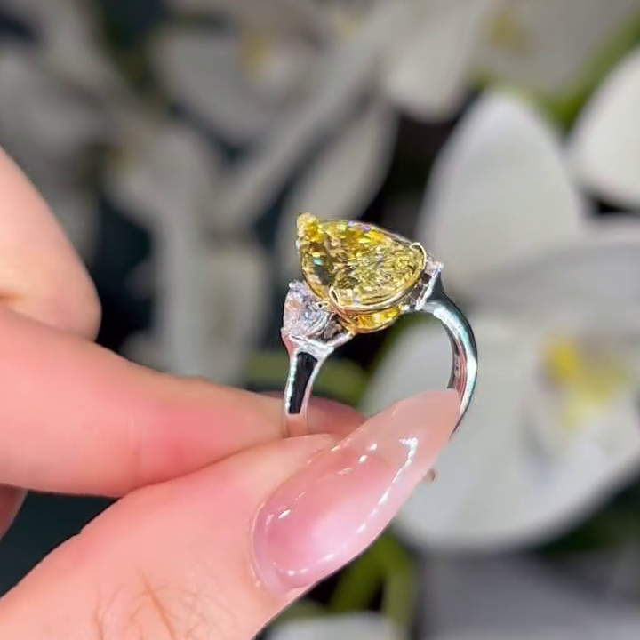 Pear Fancy Yellow 6.00tcw Lab Grown Diamond Two Tone Cathedral Three Stone Engagement Ring, VVS-VS Clarity