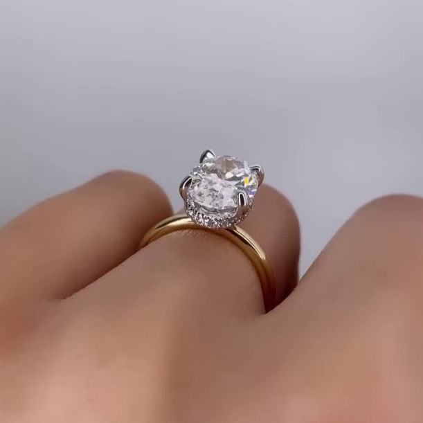 Oval diamond hidden halo engagement ring with 4 prong setting
