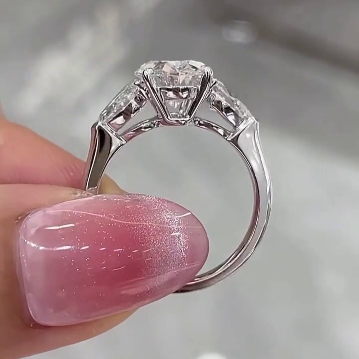 Oval 5.00tcw Lab Grown Diamond 3 Stone Engagement Ring | D-E-F Color VVS-VS Clarity | Pear Side Stones | IGI Certified