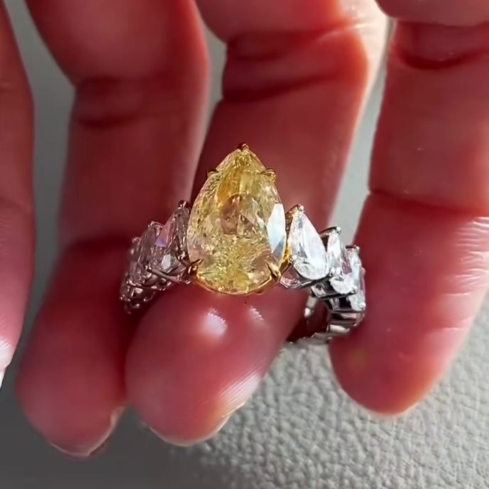 Pear Fancy Yellow 9.00tcw Lab Grown Diamond Pave Engagement Ring, VS Clarity - IGI Certified