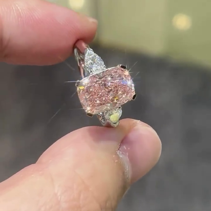 4.40tcw Fancy Pink Cushion Lab Grown Diamond Ring | 0.40ct Pear Side Stones | Three Stone Style Ring | White Gold | With  IGI Certified