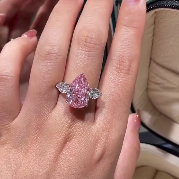 Fancy Pink 7.00tcw Lab Diamond Three-Stone Engagement Ring | Pear Shape | IGI Certified